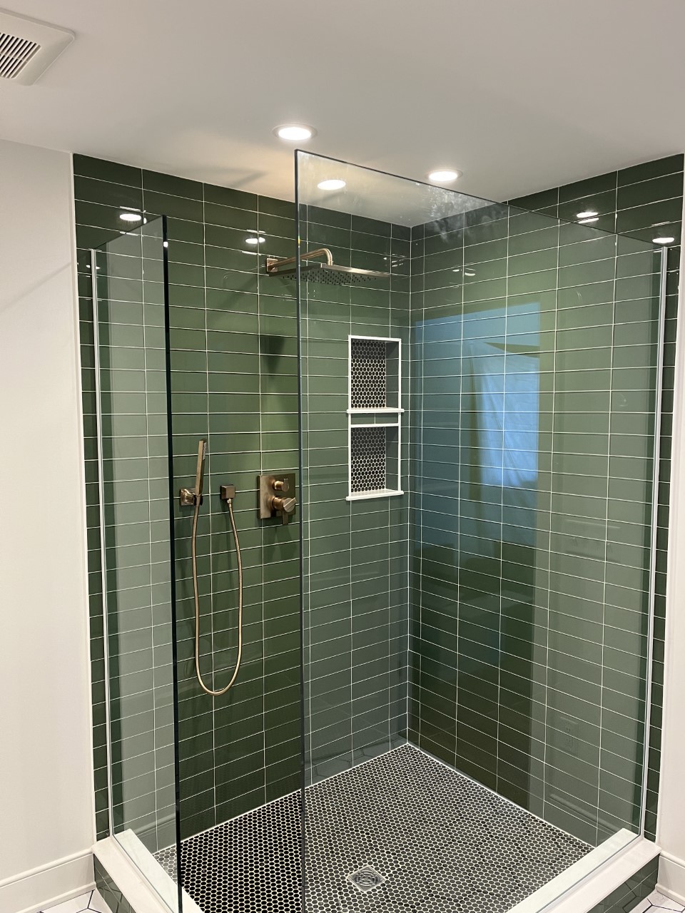 Custom glass shower enclosure installation